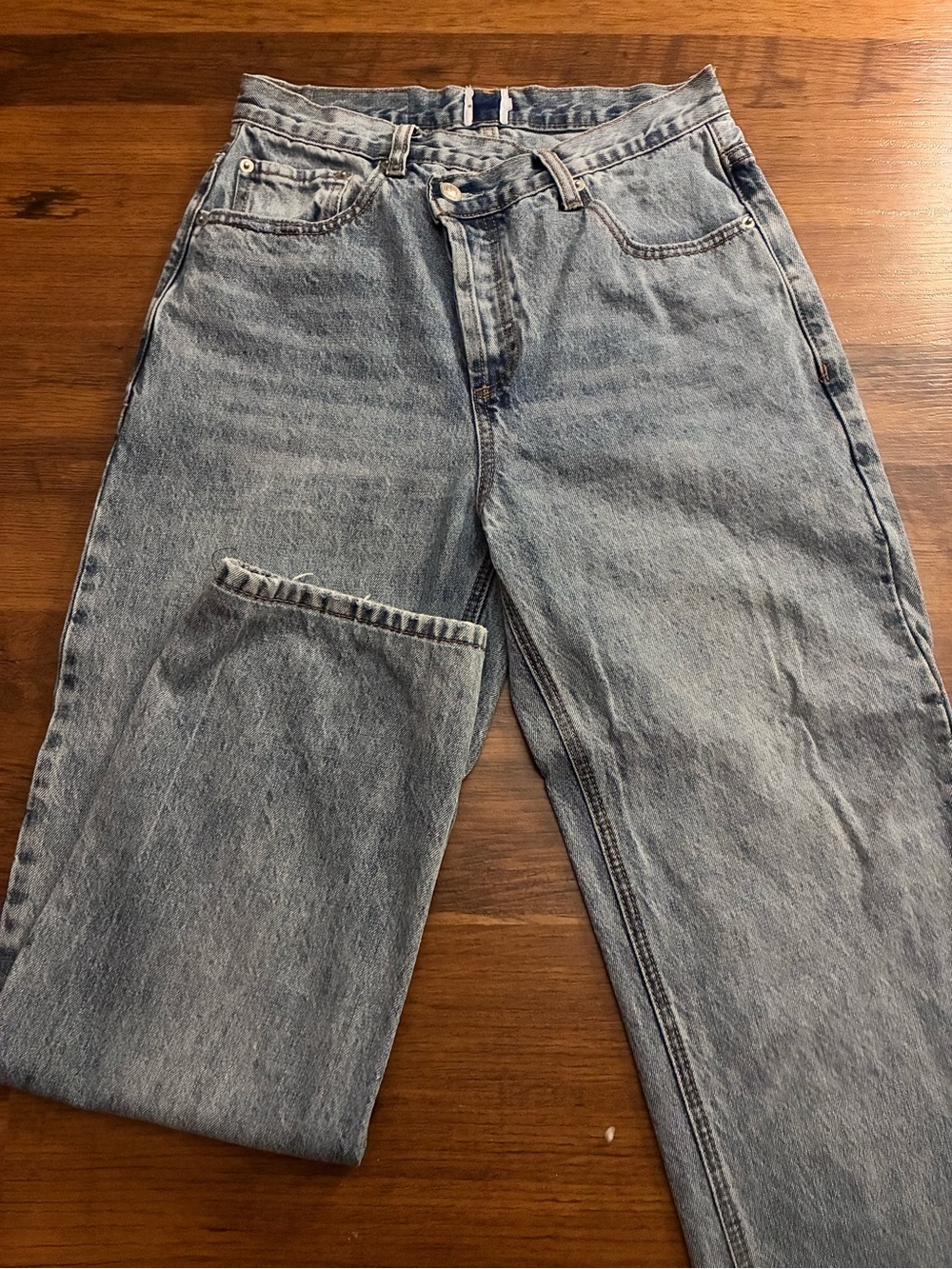 Princess Polly asymmetrical jeans